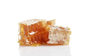 three pieces of honeycom isolated on white