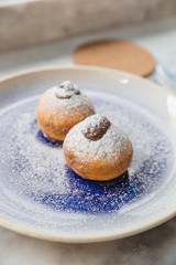 Bombolone is an Italian filled doughnut and is eaten as a snack food and dessert.