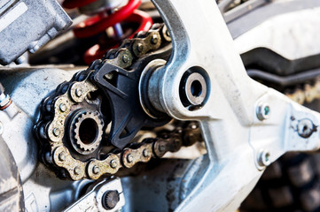 Close-up of a digger with an asterisk a trial motorcycle