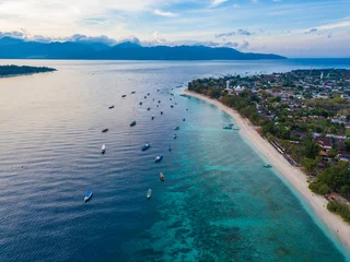 Papier Peint photo autocollant Photo aérienne Aerial view of Gili Trawangan Island coastline with boats and buildings, West Nusa Tenggara, Indonesia
