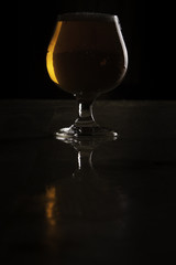 Imperial Ale in Goblet in Elegant Dark Bar