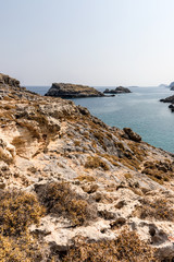 Fototapeta na wymiar Coastline landscape on the way to the Kleoboulous's tomb in Lindos on the Rhodes Island, Greece. 