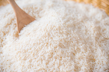 Rice grain in wooden basket