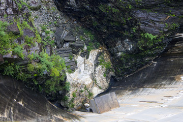 Obraz premium The Contra Dam, also known as the Verzasca Dam or the Locarno Dam, an arch dam on the Verzasca River in Ticino, Switzerland. A popular bungee jumping venue after the James Bond film GoldenEye