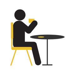 Fototapeta premium Man drinking coffee or tea at table silhouette icon