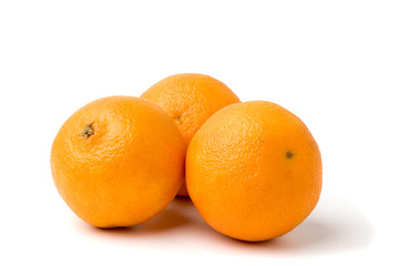 Ripe tangerines on a white