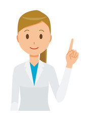 A female doctor wearing a white coat is pointing