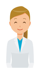 A woman doctor wearing a white suit is smiling