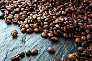 coffee beans on rustic darkbackground. Roasted coffee beans concept