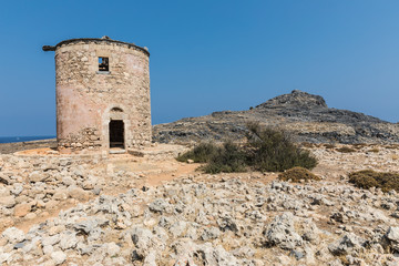 A ruined mill on the way to the Kleoboulous's tomb in Lindos on the Rhodes Island, Greece. 