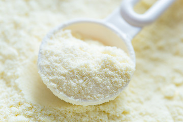 Powdered milk with spoon for baby