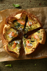 Sliced Salmon and broccoli quiche above