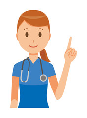 A female nurse wearing a blue scrub is pointing