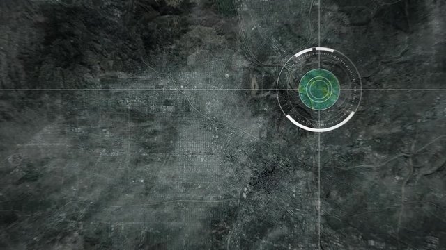 Surveillance drone camera scanning a big american city, POV of drone or satellite with HUD and heat camera monitoring a city suburb in the USA
