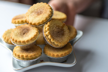 Closeup View Spicy Christmas Mince Pies on Star Shape Plate