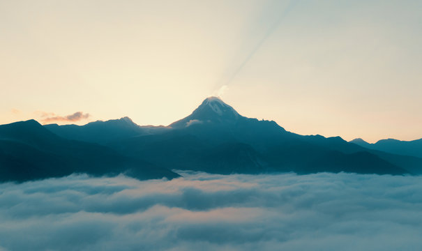 Beautiful sunrise in Stepancminda, Georgia. View to the Kazbek mountain