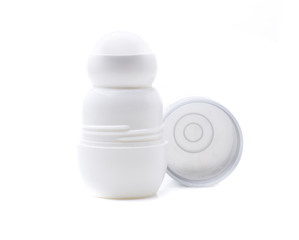 a small open white roll-on deodorant