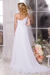Fototapeta premium woman bride with hair and makeup dress