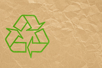 Recycle symbol on paper