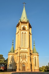 Fototapeta na wymiar Beautiful historic church. Parish of the Blessed Trinity in Wilamowice in Poland.