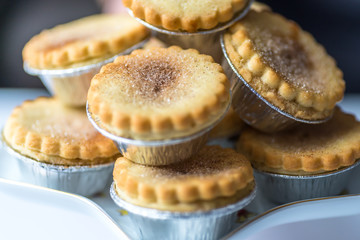 Closeup View Spicy Christmas Mince Pies on Star Shape Plate © Jevanto Protography