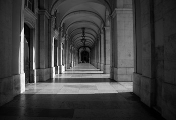 stone archway around the Praça do Comércio in the center of Lisbon, Portugal