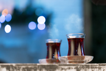 Christmas hot  tea, and light bokeh