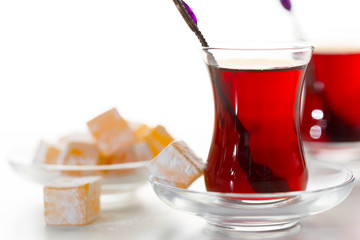 Turkish tea in traditional glass isolated on white background
