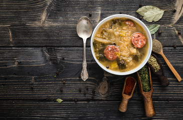 Slovak christmas cabbage soup with mushrooms on natural background.