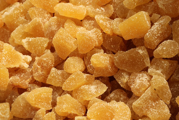 background of sugary cubes of ginger roots