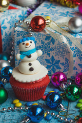 Christmas cupcake with colored decorations