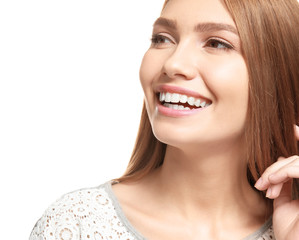 Young beautiful smiling woman on white background, closeup