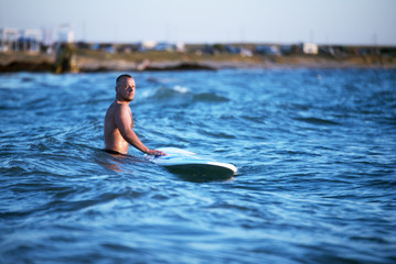 The man at paddleboard