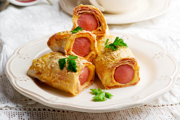 sausages  with cheese in lavash for a breackfast