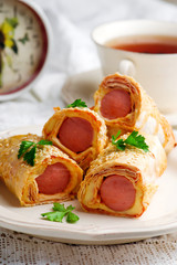 sausages  with cheese in lavash for a breackfast
