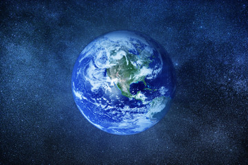 the Earth globe from space in a star field