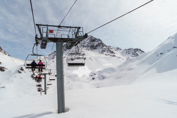 Fototapeta na wymiar Skiing in the mountains of ski area Les arcs - La Plagne, France.