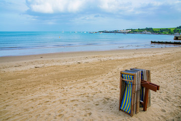 Deck chairs on swanage beach