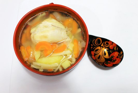 Soup of homemade noodles with chicken and vegetables