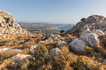 Stony landscape with trees of the Tsambika mountain on the Rhodes Island, Greece