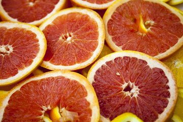 Grapefruit slices background texture.