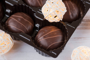 Chocolates and Christmas garlands glow