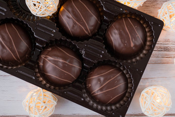 Chocolates and Christmas garlands glow
