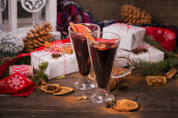 Mulled wine with fruits, cinnamon sticks, anise and decorations