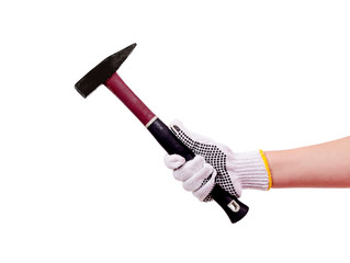 female hand in a glove holds a hammer on a white background close-up