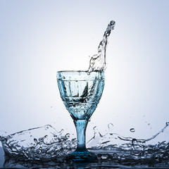 A photograph of a spike in alcohol in a vintage glass.