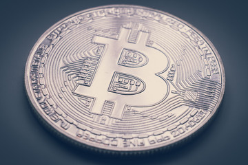 Silver bitcoin (physical), macro shot
