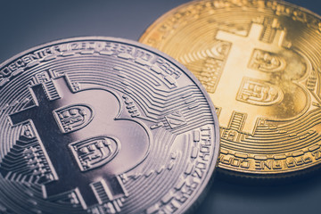 Gold and silver bitcoin (physical), macro shot