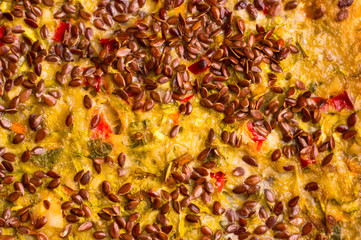 vegetable casserole with cheese, zucchini, Basil, red pepper and flax seed