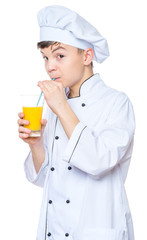 Teen boy wearing chef uniform